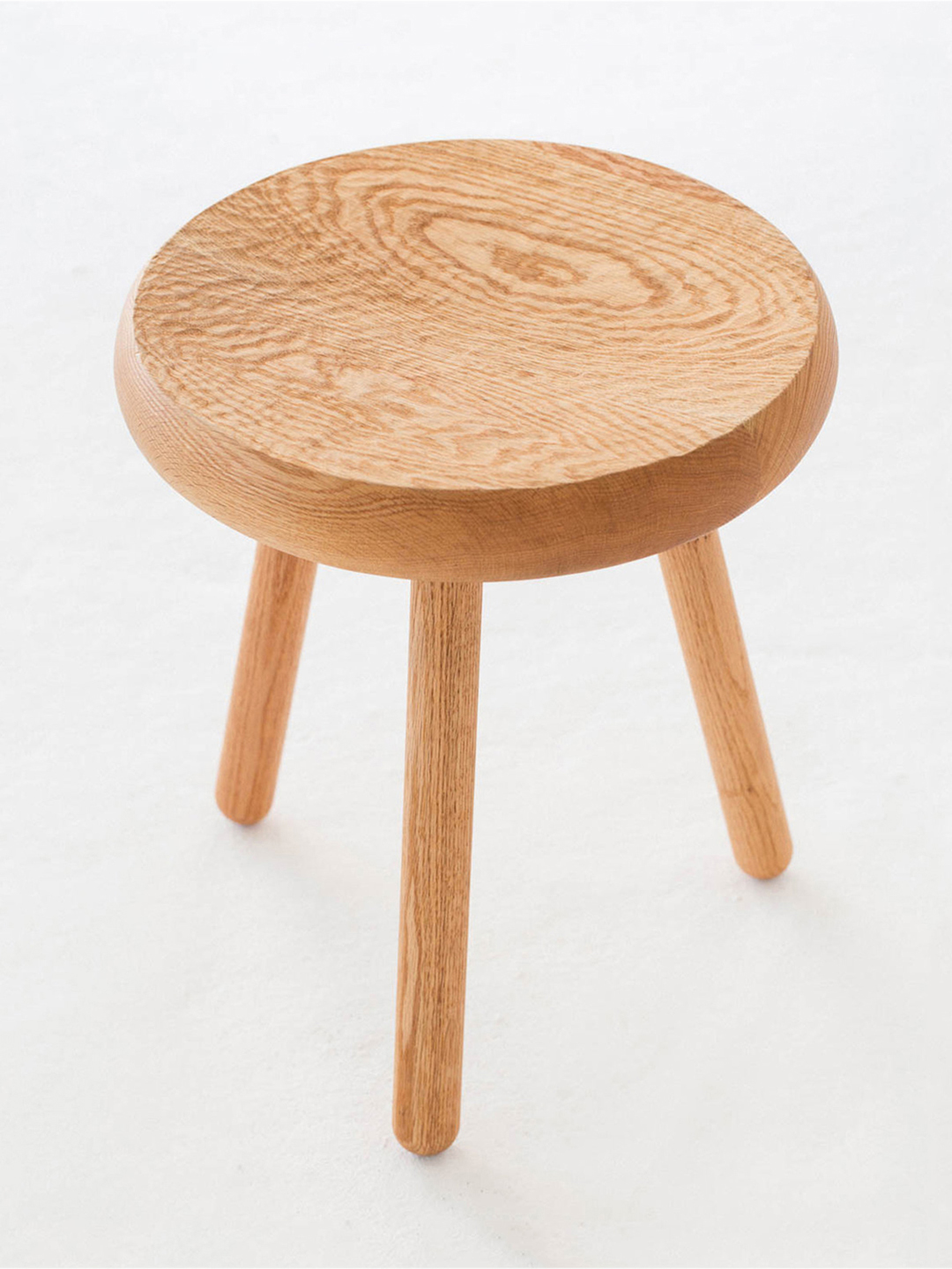 De JONG and Co Dibbet Stool in Natural Maple hand rubbed oil and wax finish and concave tactile and smooth texture