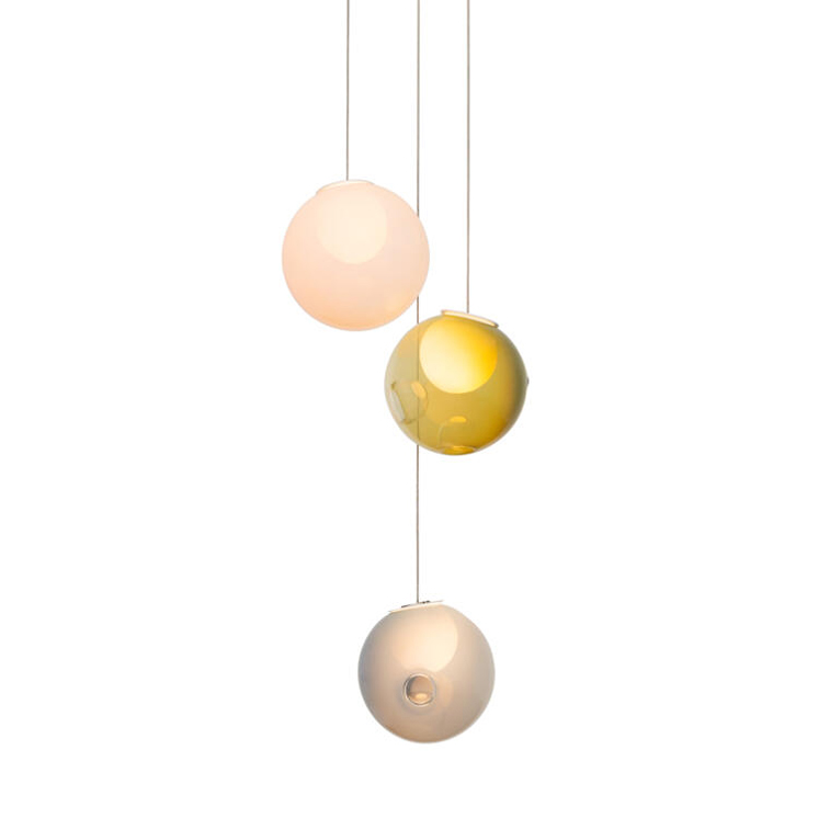Bocci 28 Series 28.3 3 globe pendant random with opaque white yellow hand blown glass room furniture braided low voltage 20 watt xenon bulb spherical dynamic clusters blown glass sculpture
