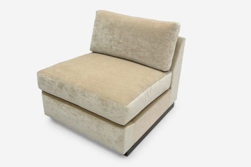 ROOM Vienne Slipper Chair with cream cushions and upholstery, flat seams, Kiln-dried hardwood frame, and maple base with walnut finish and loose back cushions in foam and down & feather fill fully customizable made to order custom ROOM Furniture